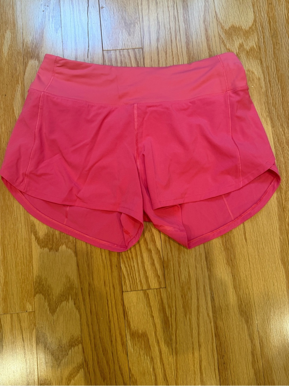 Women’s Lululemon Pink Speed Up mid rise shorts. 4 inch.